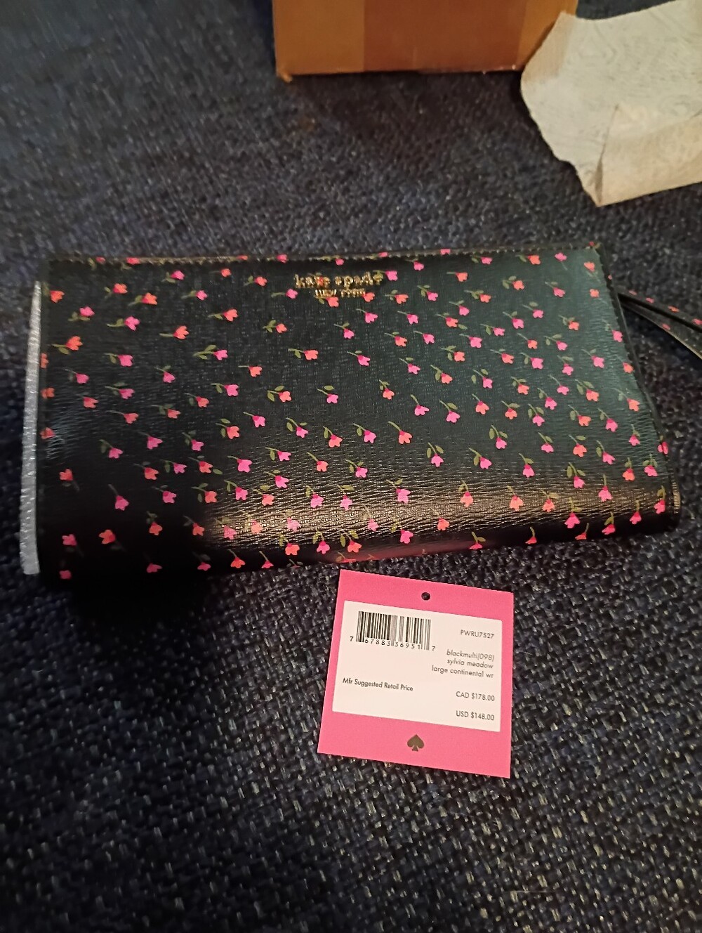 kate spade Black Floral Print Wristlet with Pink Accents
